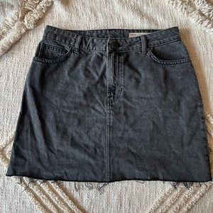 Black denim mini skirt
